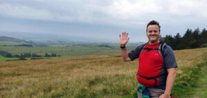 Large man in a large landscape